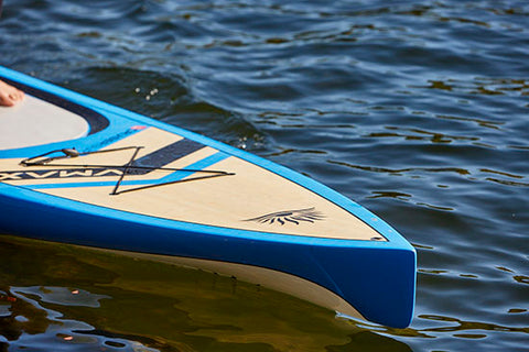 A displacement nose stand up paddle board