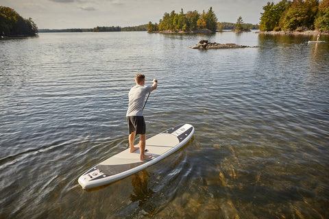 Paddle Boarder using Inflatable Paddle Board