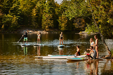 Stand up paddle boarding on a lake