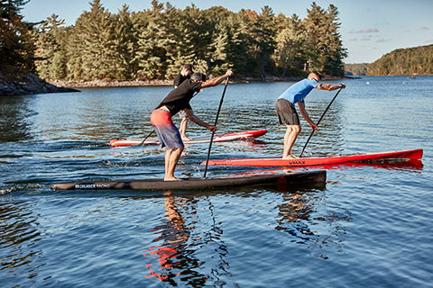 Stand up paddle boarding at a fast speed