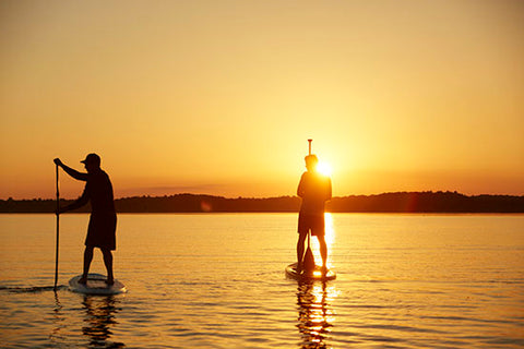 a stand up paddle boarding with the correct length paddle