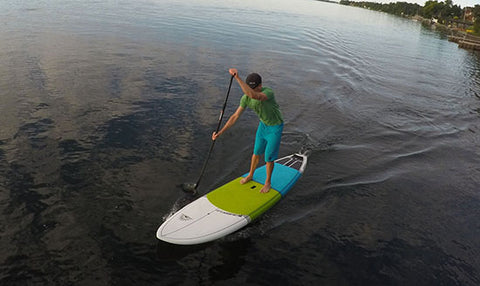 stand up paddle boarding with an adjustable paddle